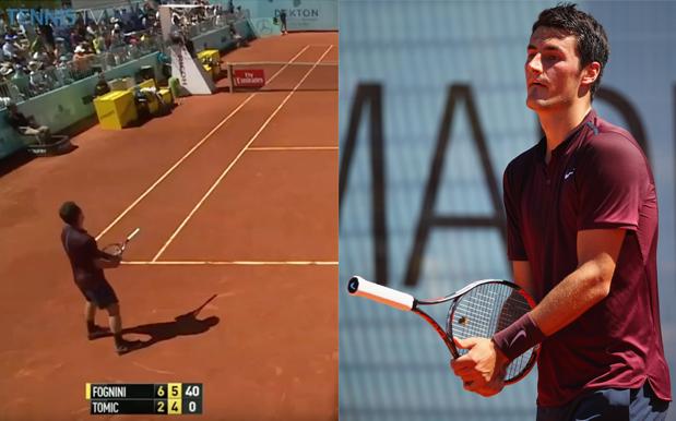 Tomic trying to return serve with backwards racket